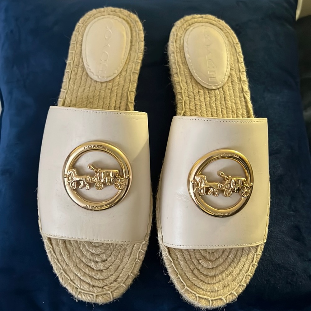 Slay this summer with a brand new pair of coach slip on sandals